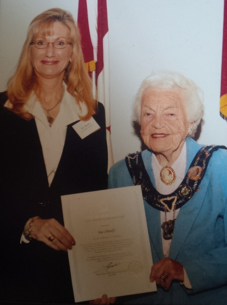 Sue receiving Civic Award of Recognition from Mayor Hazel McCallion