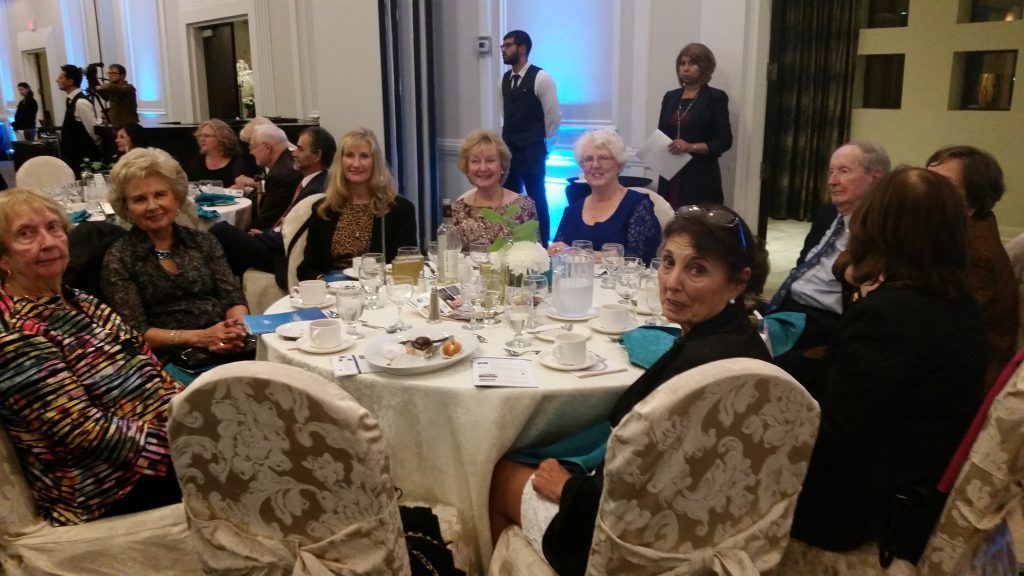 Sue at the Friends of the Museums of Mississauga table about to receive a Credit Award from Heritage Mississauga