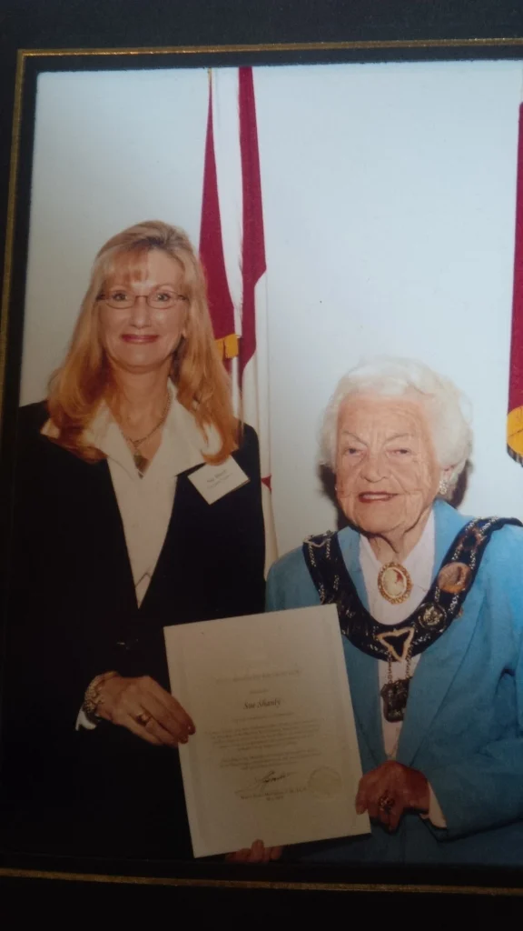 Sue Shanly receiving her City of Mississauga Civic Award of Recognition from former Mayor Hazel McCallion